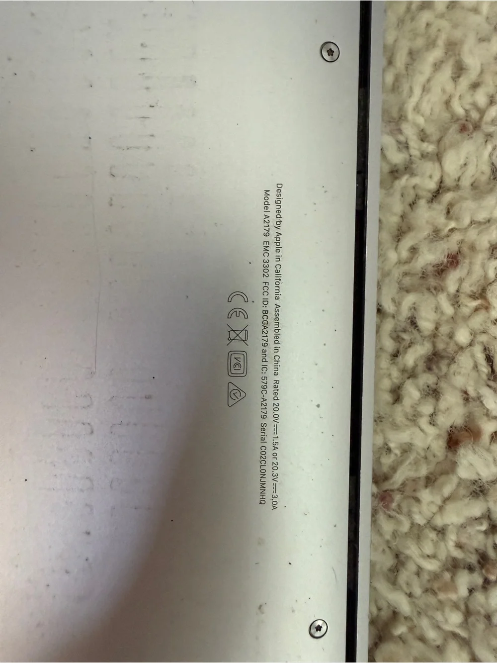 Apple Silver MacBook Top-View with Apple Logo